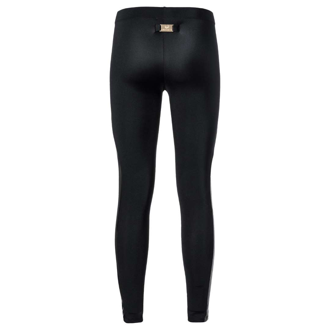 Black, shiny leggings by Eniqua, seen from behind, with a small rectangular label on the waistband. Made in Italy for exceptional style.